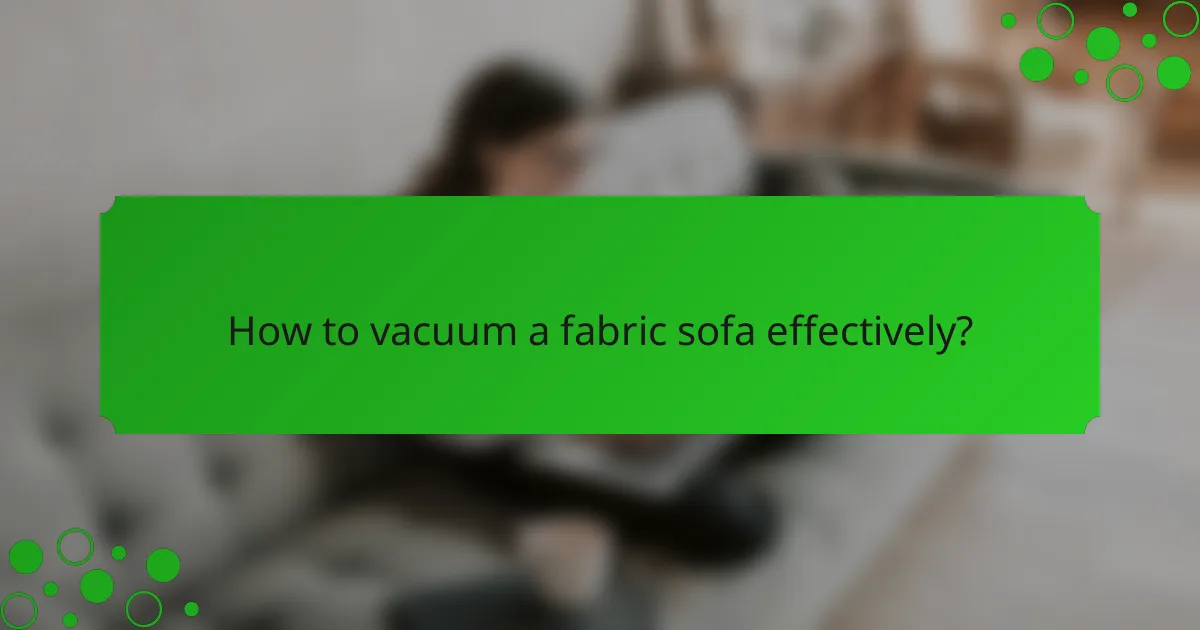 How to vacuum a fabric sofa effectively?